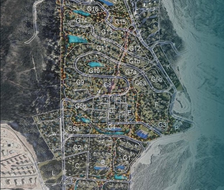 Aerial map view of a coastal residential development with labeled sections, streets, and amenities along a turquoise waterfront